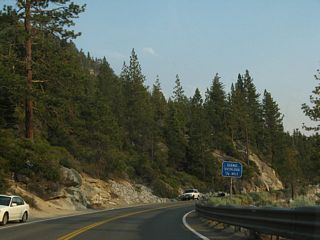 Nevada 28 turns south to follow the lakeshore through the state park. A scenic overlook is available ahead.