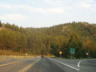Turn right via the ramp to continue the loop tour around Lake Tahoe via U.S. 50 west. Destinations along U.S. 50 west include Cave Rock, Zephyr Cove, Stateline, South Lake Tahoe, Placerville, and Sacramento. Turn left to follow U.S. 50 east to Carson City.