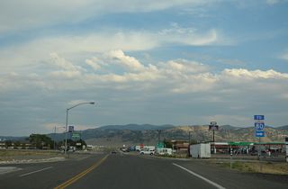 Business Loop I-80 & SR 233 navigate along an S-curve southeast from the Wells street grid to intersect U.S. 93 (Great Basin Highway). SR 233 ends as U.S. 93 returns the business route to adjacent Interstate 80.