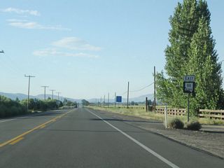 This Nevada 88 east reassurance shield is posted after the intersection with Nevada 206 (Fairview Lane). Nevada 206 travels west and then north through Sheridan, Mottsville, Walleys Hot Springs, and Genoa before ending at U.S. 395 north of Minden and south of Carson City. Despite the EAST cardinal direction, Nevada 88 travels due north for its entire run in Nevada.