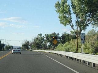 Turn right on Nevada 756 (Centerville Lane) to downtown Gardnerville. Centerville Lane also continues to the west of this intersection, traveling to Nevada 206/Foothill Road near Sheridan at the foot of the Carson Range that separates the Carson Valley from the Lake Tahoe basin.