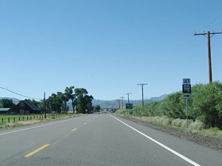 Southbound Nevada 88 approaches the junction with Nevada 206/Fairview Lane.