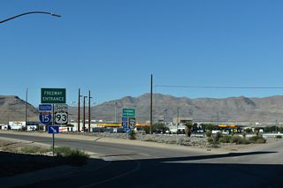 The access road to the Apex Landfill ties into the Garnet Interchange from the east.