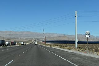 The Playa Solar and Harry Allen Solar Energy solar farms spread along the east side of U.S. 93 across Dry Lake Valley.