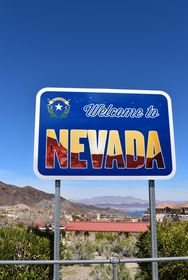 The Nevada welcome sign at the Nevada Welcome Center located off the southwest corner of the intersection joining the east end of Nevada Way with U.S. 93 Business (Boulder City Parkway).