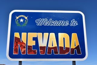 The Nevada welcome sign at the Nevada Welcome Center located off the southwest corner of the intersection joining the east end of Nevada Way with U.S. 93 Business (Boulder City Parkway).