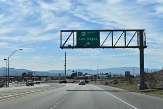 Northbound U.S. 93 Business makes a right turn at Nevada Way. Historically a wye-intersection joined U.S. 93/466 with Nevada Way at a location on the back side of the adjacent shopping center.