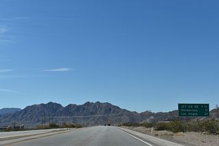 This distance sign posted after Gingerwood Street still references U.S. 95 as meeting U.S. 93 Business (Boulder City Parkway) in 1.5 miles. U.S. 95 was relocated onto I-11 in 2018.