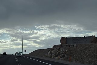 The Boulder City welcome sign is just east of the half diamond interchange with Railroad Pass Casino Road.