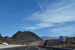 U.S. 93 Business east concludes at a wye interchange overlaying Exit 2 along I-11/U.S. 93.