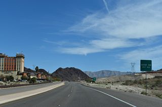 Boulder City Parkway passes the Hoover Dam Lodge a half mile ahead of SR 172 (Hoover Dam Access Road).