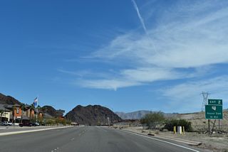 U.S. 93 Business ties into the roundabout interchange (Exit 2) joining I-11/U.S. 93 with SR 172.