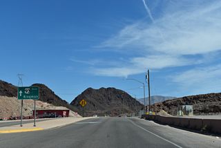 A lane drop occurs east of Hoover Dam Lodge where U.S. 93 Business shifts onto a ramp joining Exit 2 from I-11/U.S. 93 south to SR 172.
