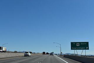 Prior to the construction of Interstate 11, U.S. 95 separated from U.S. 93 south at a diamond interchange. This exchange now joins U.S. 93 Business with SR 173 (Veterans Memorial Highway) south 1.08 miles to U.S. 95 at I-11/U.S. 93 (Boulder City Bypass).