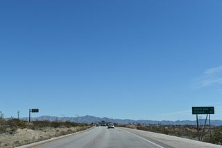 This distance sign is posted 80 miles from where U.S. 93 joins Interstate 40 east in Kingman, Arizona.