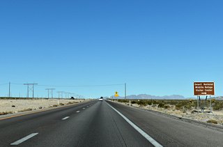 Corn Creek Road joins U.S. 95 with the community of Corn Creek and Desert National Wildlife Refuge.