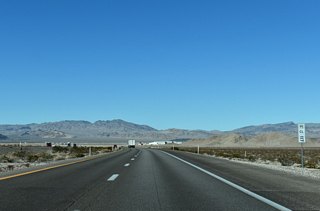 U.S. 95 curves westward on the approach to Indian Springs.