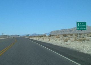 SR 160 travels to Pahrump in the Pahrump Valley and east across the Spring Mountains at Mountain Springs to Enterprise in the Las Vegas metropolitan area.