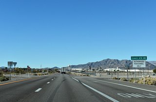 U.S. 95 lines the south border of Creech AFB with Perimeter Road serving as the main entrance.