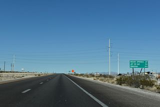 Northwest from Las Vegas, U.S. 95 passes by Desert National Wildlife Range along a sparsely populated stretch 27 miles to Indian Springs.