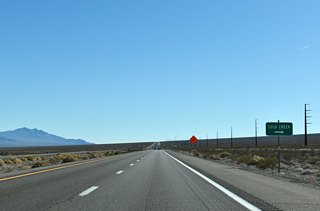 Cold Creek Road leads 13.6 miles southwest from U.S. 95 to Timberlane Drive and the community of Cold Creek at the base of Bonanza Peak.
