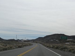 Southbound U.S. 95 enters the Esmeralda County seat of Goldfield (elevation 5,690 feet above sea level). A historic mining town, Goldfield was founded in 1902 and the population briefly surged to around 20,000 due to the discovery of gold. The unincorporated town gradually lost population from 1910 onward and was home to just 225 as of the 2020 Census.