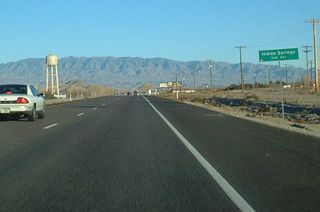 U.S. 95 south continues east into the unincorporated community of Indian Springs. Located adjacent to Creech Air Force Base, the town offers some motorist services.
