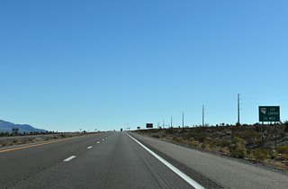 SR 156 travels nearly 17 miles southwest, joining U.S. 95 with Lee Canyon to the north of Charleston Peak (11,916 feet).