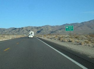 SR 160 constitutes an 80.30 mile long loop south from U.S. 95 to Pahrump, the most populous community in Nye County, and east to Enterprise in the Las Vegas area.