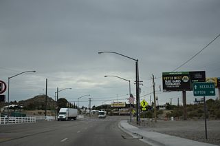 Nipton Road continues westward from the end of SR 164 into California as a locally maintained route to the unincorporated community of Nipton and Interstate 15 at the Nipton Road interchange (Exit 286).