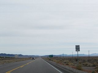 U.S. 95 bee lines southeast across Sarcobatus Flat toward Coba Mountain.