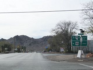 U.S. 95 turns southeast onto 2nd Street while Main Street continues southwest as SR 374 (Death Valley Road). SR 374 west to Rhyolite Road north leads to the ghost towns of Bullfrog and Rhyolite.