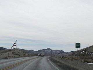 Passing east of Brock Mountain, U.S. 95 south reaches Tonopah Summit (elevation 6,256 feet above sea level).