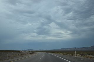 U.S. 95 turns southward at Clark County milepost 38, west of Keyhole Canyon in the Eldorado Mountains.