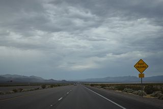Reaching its lowest point in Eldorado Valley, U.S. 95 passes through the northeastern corner of the sprawling Eldorado Valley Dry Lake Bed.