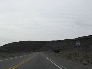 U.S. 95 leaves Goldfield south of Lida Avenue and east of Spearhead Point on Malpais Mesa.