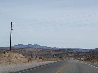 U.S. 95 runs along the west side of the Oasis Valley adjacent to the Bullfrog Hills.