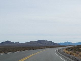 U.S. 95 curves south around Springdale Mountain from Nye County milepost 76.