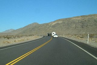 Curving northward, U.S. 95 passes the Point of Rocks between the Spring Mountains and Specter Range.