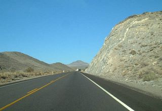 Turning eastward from the Spring Mountains, U.S. 95 proceeds across Mercury Valley.