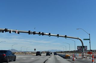 Bermuda Road intersects St. Rose Parkway north from an industrial park area populated with distribution centers.