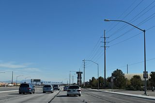 The lone reassurance marker for SR 146 east appears beyond Las Vegas Boulevard (Historic U.S. 91/466).