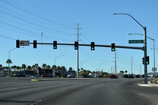 SR 146 (St. Rose Parkway) turns southwest just ahead of the traffic signal for Coronado Center.