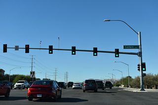 Eastern Avenue angles southeast across St. Rose Parkway at the succeeding traffic light along SR 146 westbound.