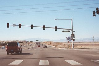 SR 146 previously intersected Gibson Road at this traffic signal, which was eliminated once I-215 was connected directly to Interstate 515.