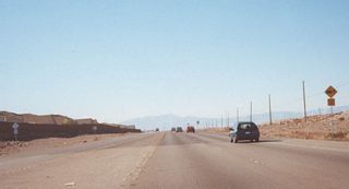 This view shows former SR 146 (Lake Mead Drive) west ahead of the Interstate 215 freeway between Interstate 515 and Gibson Road.