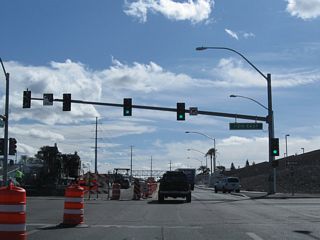 Nevada 146 will widen to four westbound lanes after this traffic signal, which connects to Interstate 215 east. Prior to the completion of Interstate 215, Nevada 146 used to share alignment with the beltway, then follow Nevada 564 east to Lake Mead National Recreation Area.