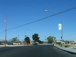 Lake Mead Boulevard partitions into two roadways between Las Vegas Boulevard and the parclo interchange with I-15/U.S. 93.