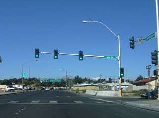 Lake Mead Boulevard west at the signalized intersection with 5th Street.
