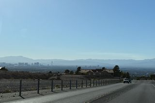 Lake Mead Boulevard enters residential areas of Sunrise Manor west of Arnona Road.